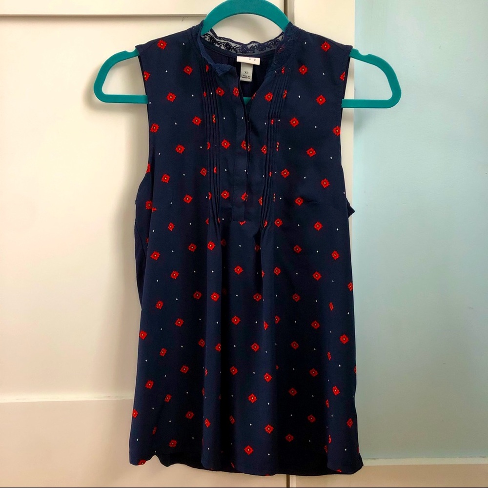 Blue blouse with orange flowers